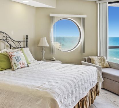 The Master Bedroom has a king size bed, comfy chase lounge, walk in closet, and a great view!