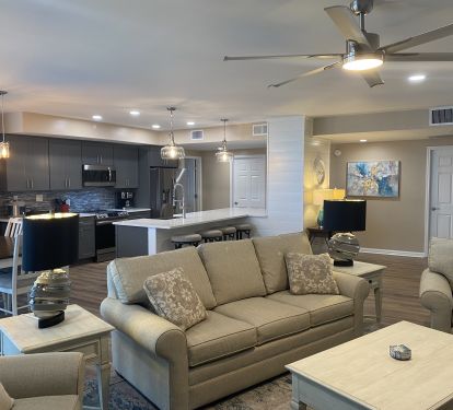 Kincaid Sofa and Chairs in Living area with Ceiling Fan and overhead Lights