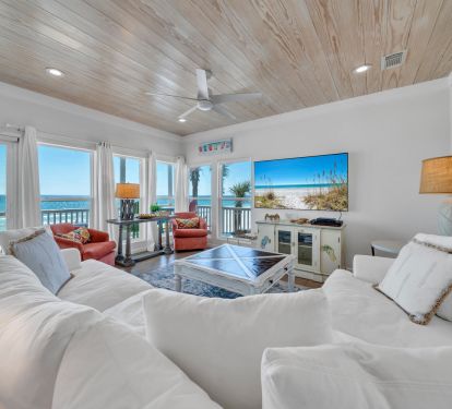 Large open Living room with floor to ceiling windows