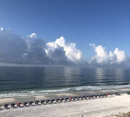 Pelican Isle 603 provides you with two chairs and umbrella service from March through October