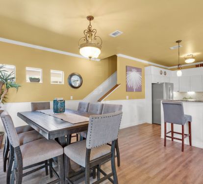 Dining area with seating for 8 and counter seating for 4.