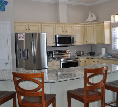 Fully stocked kitchen with views of the Sound from your kitchen window