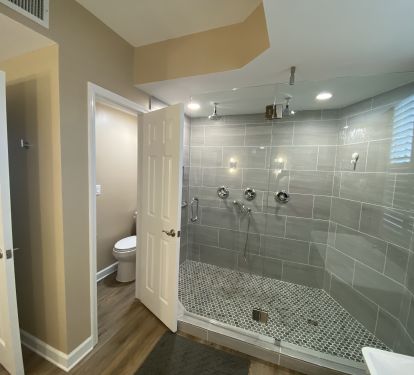 Oversized Shower with double rain heads - separate toilet area for privacy