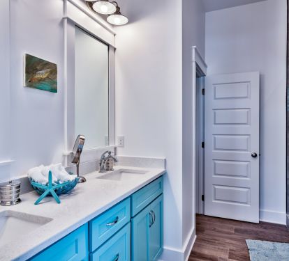 Master bath - dual sinks on quartz, private toilet closet, walk-in shower