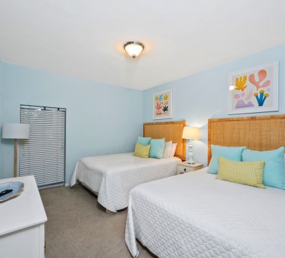 2nd bedroom has two queen size beds.