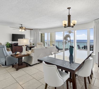 Living Room/Dining Room with floor to ceiling views of the Gulf.  Free WIFI and Direct TV plus Roku.