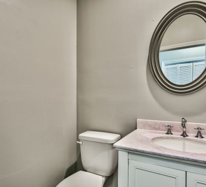 Half bath in the hallway