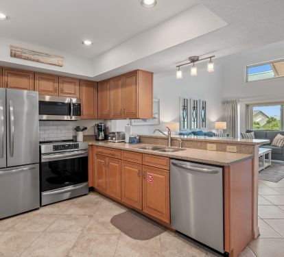 New kitchen with stainless appliances