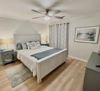 Master Bedroom with California King Bed, Night Tables and Full-size Dresser