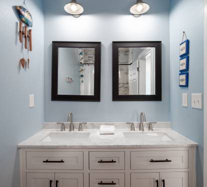 1st floor ensuite bath with double vanity and tub/shower combo.
