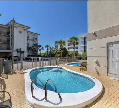 One of the community pool accessable from the first bedroom