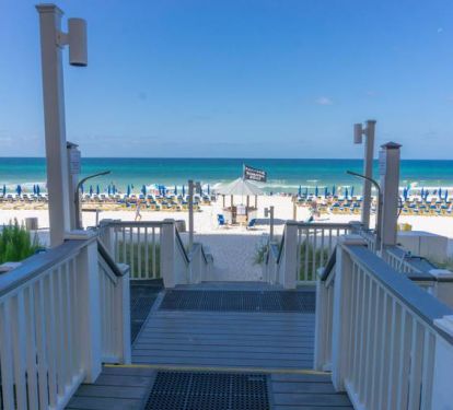Just a few steps to the beach and your FREE beach chair setups!