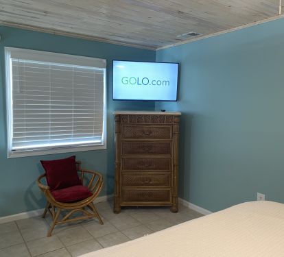 Loft Bedroom dresser with Large TV above 