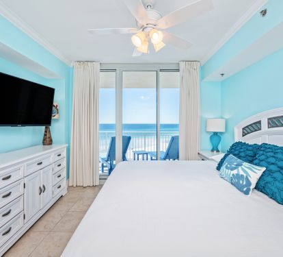 The master suite has an en suite bath, walk-in closet and balcony access