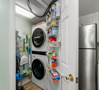 Laundry with full size washer and dryer.