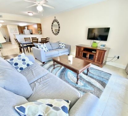 Front view of living room and dining area. 