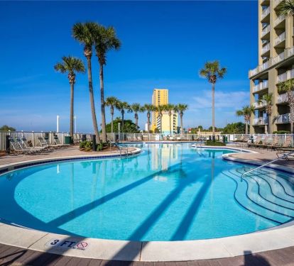 Tower 1 Pool Area has heated pool and Jacuzzi and a fantastic Tiki Hut
