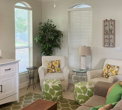 Living area has plenty of seating with sofa, loveseat and 2 chairs