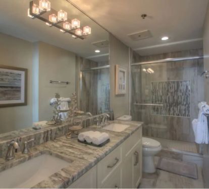 Master Bathroom with granite countertops &amp; tile shower