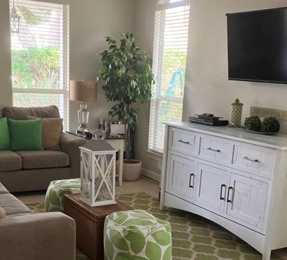 Living room has custom QUEEN murphy bed cabinet with memory foam mattress
