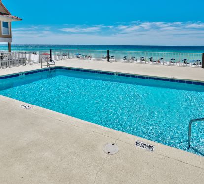 Pool is directly on your private beach. This is your beach access w/ restrooms
