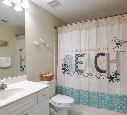 Second bathroom with tub /shower .