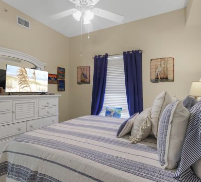 Guest bedroom with 1 closet and access to guest bathroom