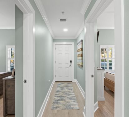 Bright coastal entryway with fresh modern finishes 