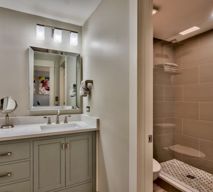 Guest en suite Bathroom with walk-in shower, &amp; quartz twin vanities