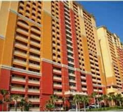 Calypso resort with encolsed walkway over street to parking structure