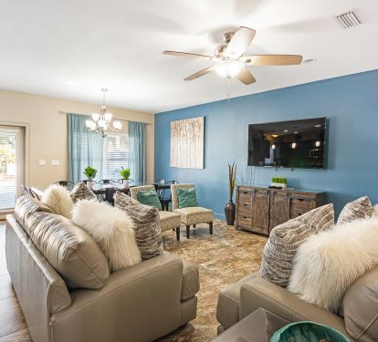 Living room offers plush leather couches