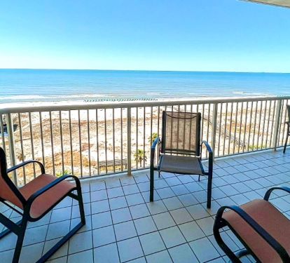 Large balcony overlooking the beautiful gulf and pools.