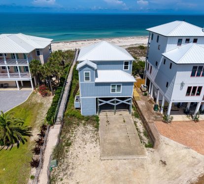 Gulf-front 4 bed / 3.5 bath with private boardwalk and parking for 4 vehicles