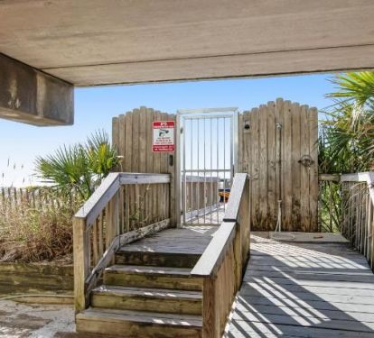 Private locked beach access at beginning of boardwalk