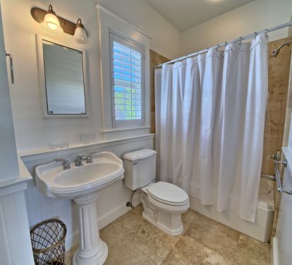 2nd Floor Queen Bedroom full bathroom with shower and tub.