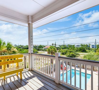 Porch overlooking the pool