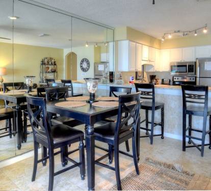 View of dining table and breakfast bar