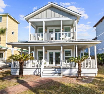 This large, luxurious home, Crystal Clear, has a private pool and beach access.