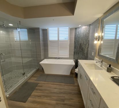 Master Bathroom with separate shower and tub - toilet area is in a separate room
