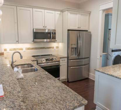 Newly updated kitchen with wet bar.