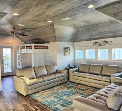 bunk room top floor sleeps 8 - plus 2nd lounge area, 65" TV with couches, views