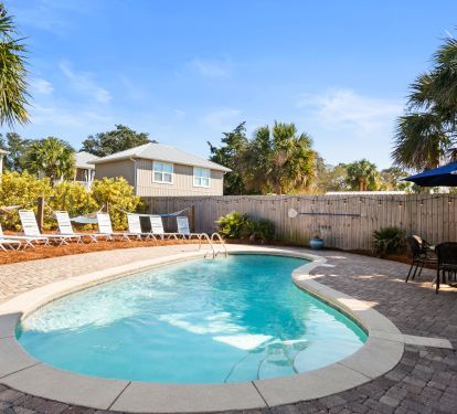backyard has plenty of lounges, hammocks, outdoor dining for 6, and gas grill