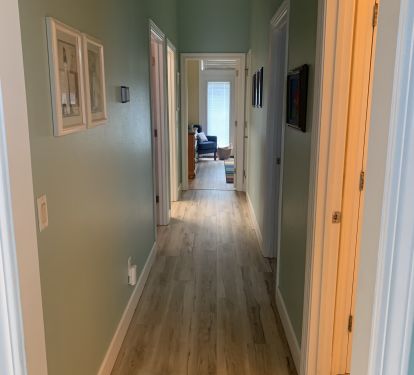 Hallway leading to bedrooms and laundry room