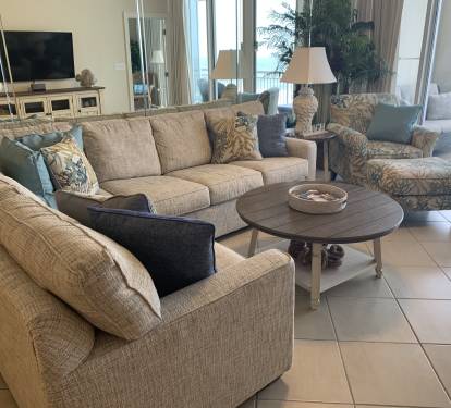 Beautiful living area with a sleeper queen sofa and a 55 inch smart tv.