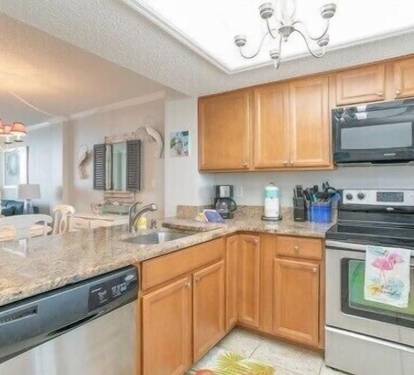 Kitchen with Stove, Microwave, Dishwasher, Coffee Maker, Toaster Oven