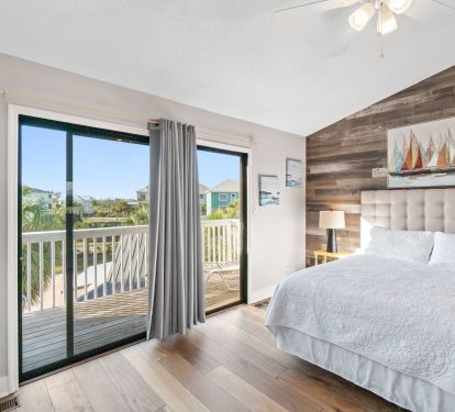 Queen bed with porch that features two loungers. Enjoy your coffee or a book! 