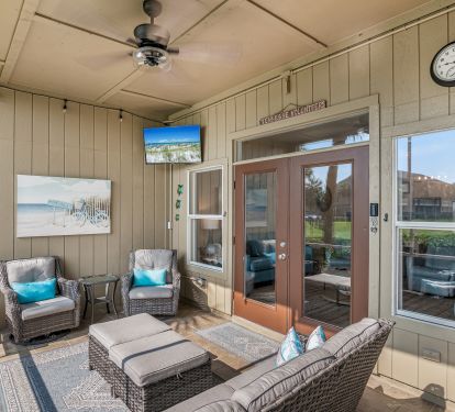 Porch off LR has TV, accent lighting, privacy screens