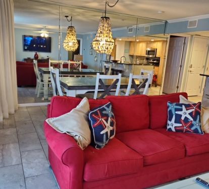 Open living with 2 sofas and ample seating.  All with a view.  One sleeper sofa