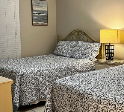 Our spacious second bedroom has 2 queen beds and direct access to the 2nd bath!