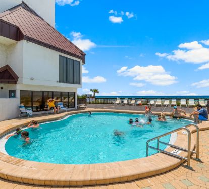 Newly resurfaced pool and lots of lounges and seating
